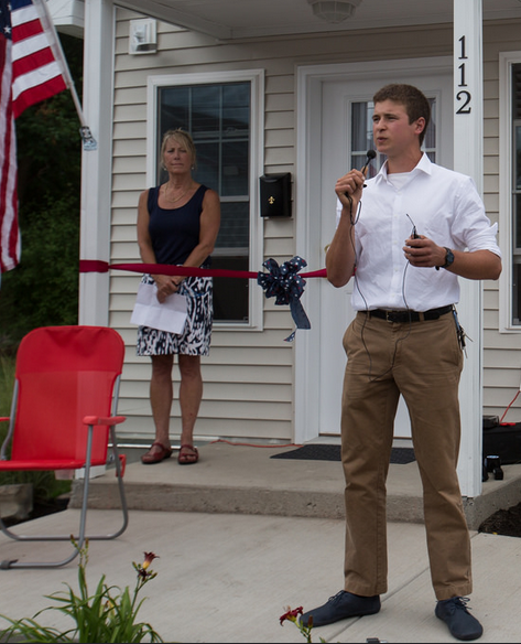 Andrew Lunetta thanks the crowd for all the support he received during the process of building the first tiny home unit through the nonprofit A Tiny Home for Good he runs. A ribbon-cutting ceremony held July 22 opened the doors for two Syracuse veterans who have faced homelessness.